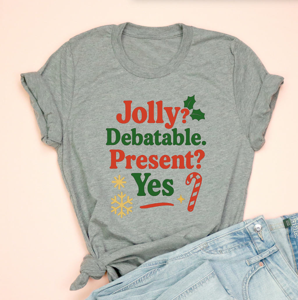 Jolly? Debatable. Present? Yes Christmas Tee